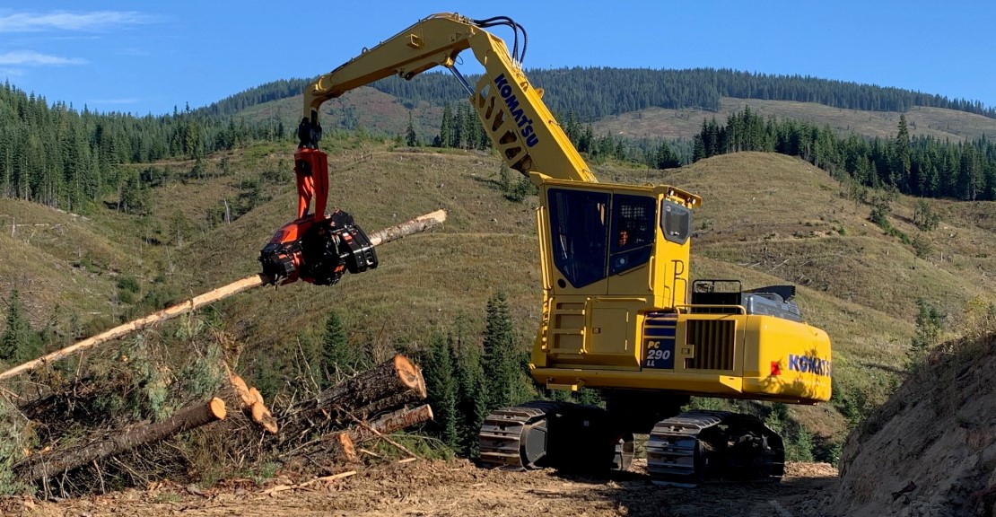 Komatsu PC290LL-11 log loader and swing machine lifting log 