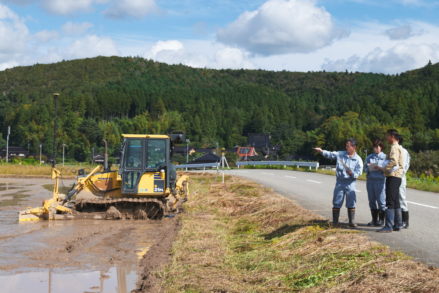 Komatsu loaned eight agricultural dozers to farmers so they could use them to repair badly damaged fields