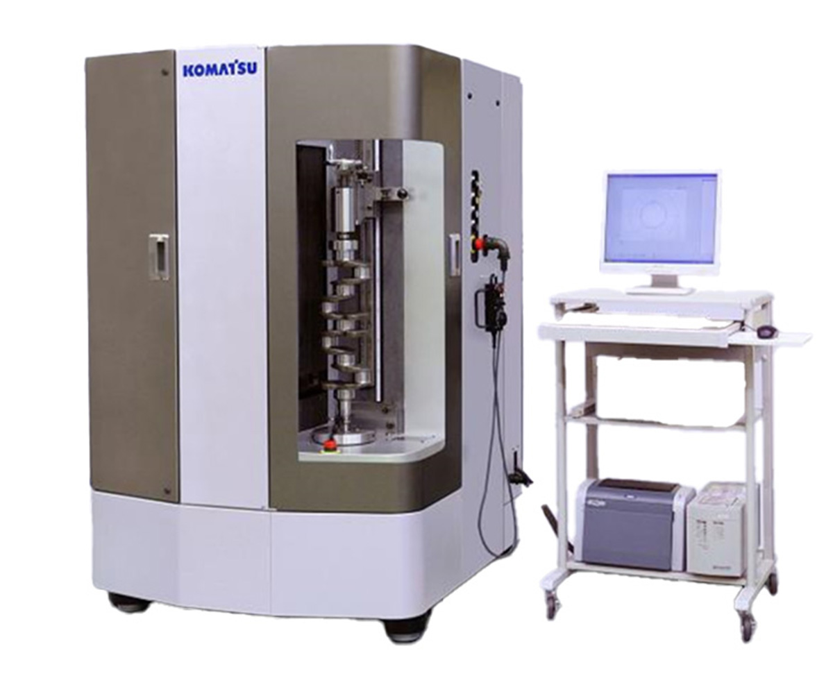 Komatsu industrial testing machine with computer setup