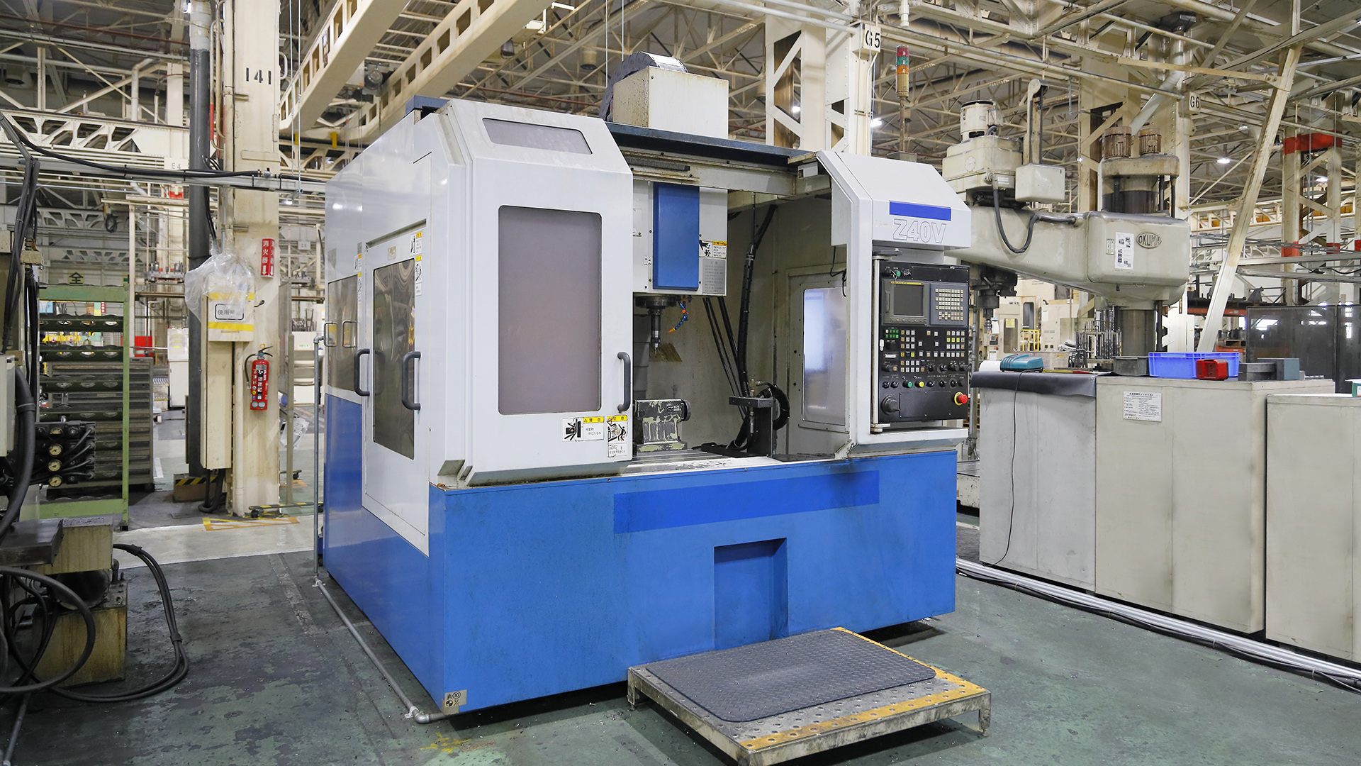 Industrial CNC machine in factory setting