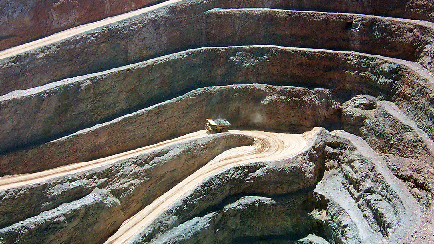 a komatsu truck in a gold mine