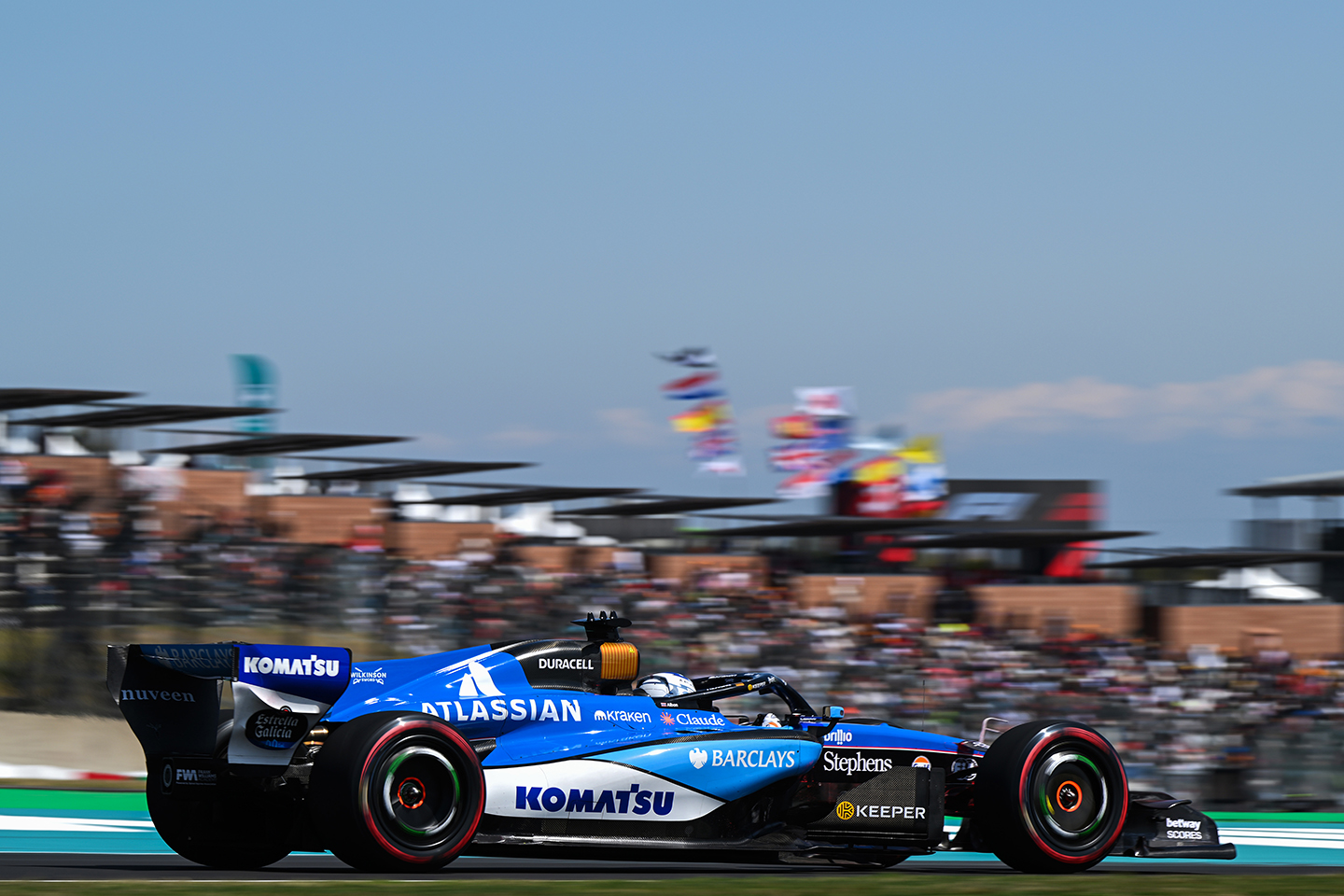 An Atlassian Williams F1 team racecar on the race track.