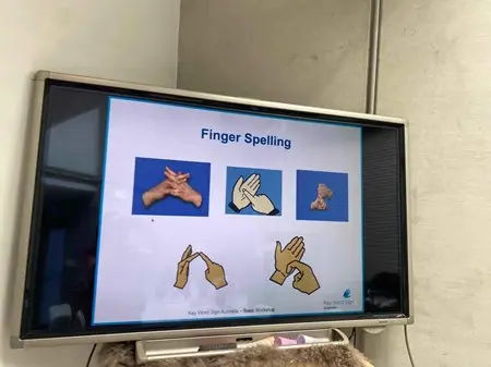 monitor with sign language images