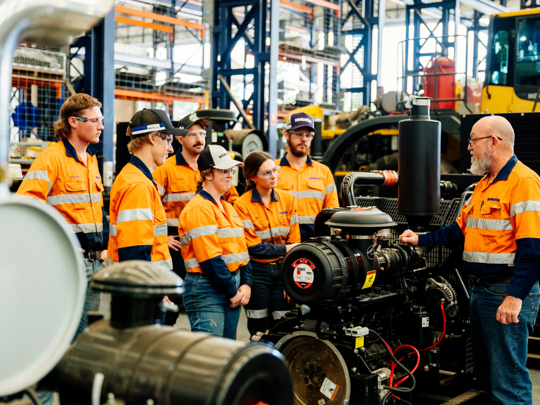 Komatsu Apprentices with trainer