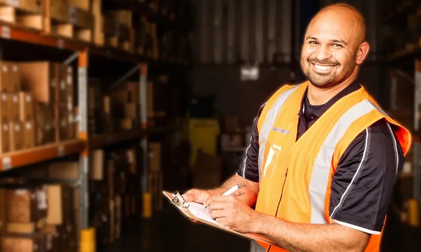 Worker at parts distribution center