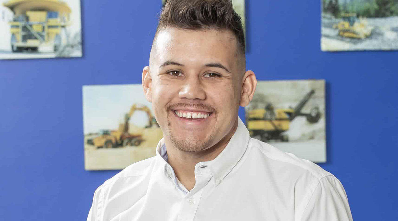 Yerko Andres Arce Alvial credits Fundación Reinventarse with helping him find a path to employment at Komatsu Cummins Chile in Santiago